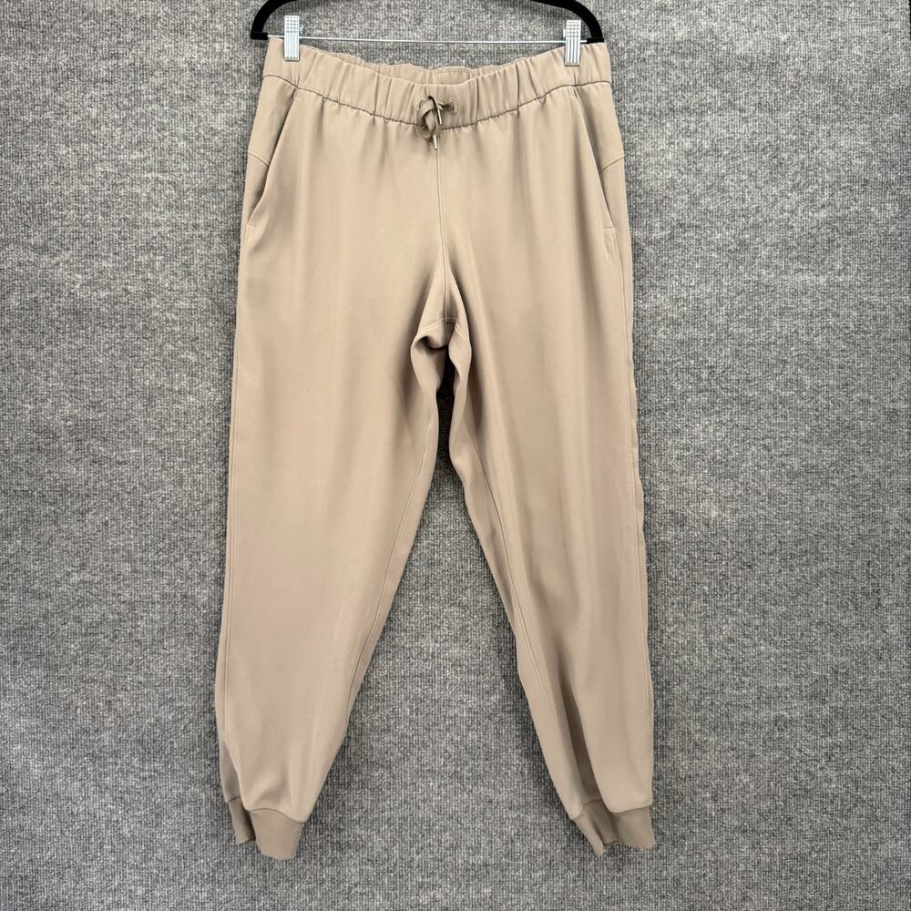 Lululemon Womens On The Fly Jogger Pants Size 10 Gray Sage Athletic Pull On